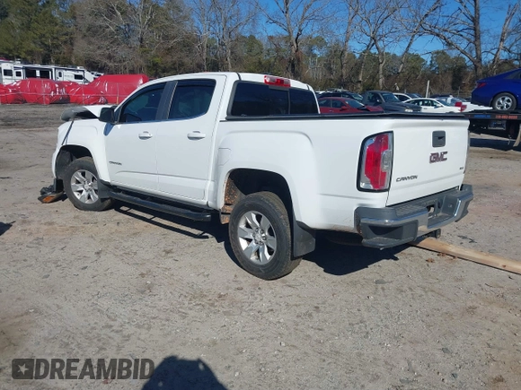 2015 GMC Canyon 2WD SLE with VIN 1GTG5BE32F1254150, listed as a IAAI auction lot 41380439 with 129,098 mi miles. Bid and sale history available at carsss.com. Image 3.