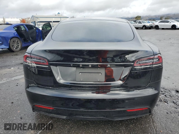 2024 Tesla Model S with VIN 5YJSA1E54RF536092, listed as a Copart auction lot 85934334 with 11,451 mi miles and Salvage title. Bid and sale history available at DreamBid. Image 6.