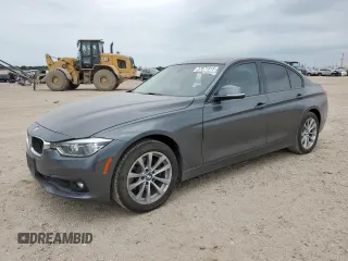 2018 BMW 3 Series 320i with VIN WBA8A9C54JAH11997, listed as a Copart auction lot 57671315 with 95,727 mi miles and Salvage title. Bid and sale history available at DreamBid. Image 1.
