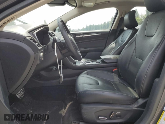 2017 Ford Fusion Titanium z VIN 3FA6P0K95HR139060, wystawiony jako Copart lot #62200755 z przebiegiem 106 133 mil mil oraz Szkoda całkowita • Salvage title. Historia ofert i sprzedaży dostępna na DreamBid. Obrazek 7.