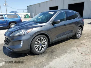 2020 Ford Escape Titanium Hybrid z VIN 1FMCU0DZ5LUA68913, wystawiony jako Copart lot #57306055 z przebiegiem 57 711 mil mil oraz Nie do naprawy • Non repairable. Historia ofert i sprzedaży dostępna na DreamBid. Obrazek 1.