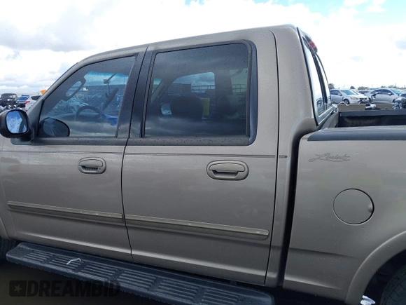 2003 Ford F-150 XLT with VIN 1FTRW07L53KD82167, listed as a IAAI auction lot 41745801 with 216,783 mi miles. Bid and sale history available at carsss.com. Image 14.