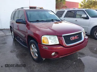 2003 GMC Envoy SLT with VIN 1GKDS13S132118361, listed as a IAAI auction lot 41909425 with 283,342 mi miles. Bid and sale history available at carsss.com. Image 1.