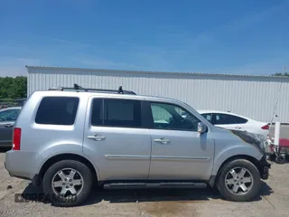 2010 Honda Pilot Touring z VIN 5FNYF4H94AB010058, wystawiony jako IAAI lot #42495313 z przebiegiem 157 306 mil mil oraz . Historia ofert i sprzedaży dostępna na DreamBid. Obrazek 14.