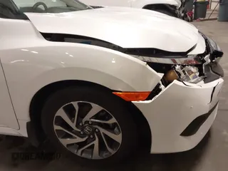 2018 Honda Civic EX with VIN 19XFC2F74JE005647, listed as a IAAI auction lot 41938607 with 90,263 mi miles and . Bid and sale history available at DreamBid. Image 18.
