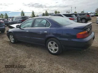 2000 Acura TL with VIN 19UUA5660YA802434, listed as a Copart auction lot 72753614 with 316,429 mi miles and Salvage Title. Bid and sale history available at carsss.com. Image 2.