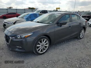 2017 Mazda 3 Touring with VIN 3MZBN1V72HM124136, listed as a Copart auction lot 62470545 with 107,895 mi miles and Salvage title. Bid and sale history available at DreamBid. Image 1.