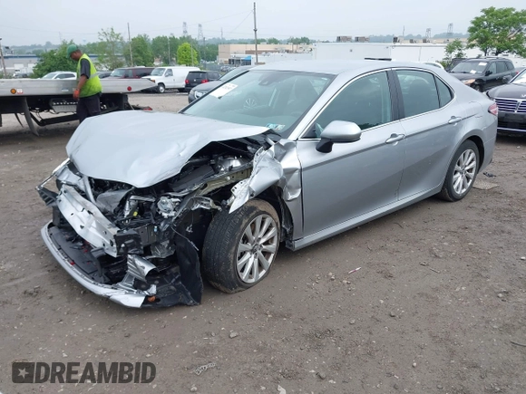 2019 Toyota Camry LE z VIN 4T1B11HK5KU813553, wystawiony jako IAAI lot #42282507 z przebiegiem 22 100 mil mil oraz . Historia ofert i sprzedaży dostępna na DreamBid. Obrazek 2.