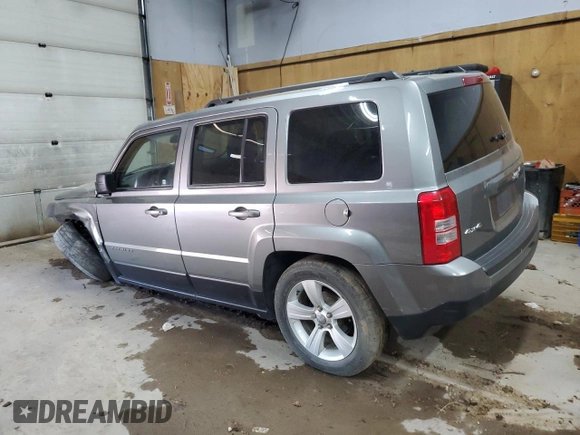 2014 Jeep Patriot Latitude with VIN 1C4NJRFBXED546921, listed as a Copart auction lot 61032895 with 133,344 mi miles and Clean title. Bid and sale history available at DreamBid. Image 2.