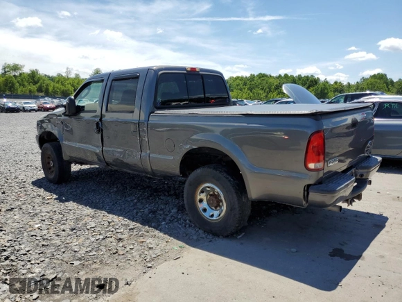 2004 Ford F-250 XL with VIN 1FTNW21L14EA16600, listed as a Copart auction lot 62814805 with 222,493 mi miles and Salvage title. Bid and sale history available at DreamBid. Image 2.