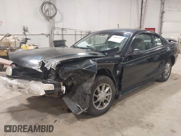 1997 Ford Mustang with VIN 1FALP4041VF157548, listed as a IAAI auction lot 39894591 with 146,891 mi miles. Bid and sale history available at carsss.com. Image 2.