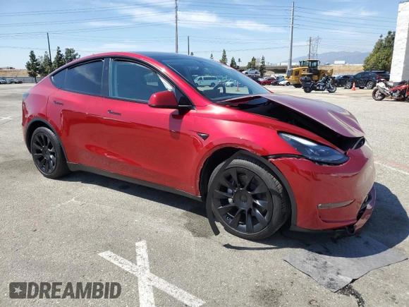 2024 Tesla Model Y Long Range with VIN 7SAYGAEE0RF016323, listed as a Copart auction lot 50253205 with 12,490 mi miles and Salvage title. Bid and sale history available at DreamBid. Image 4.