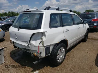 2003 Mitsubishi Outlander LS with VIN JA4LZ31G83U064536, listed as a Copart auction lot 60733773 with 90,439 mi miles and Salvage Title. Bid and sale history available at carsss.com. Image 3.