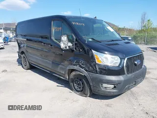 2021 Ford Transit Cargo with VIN 1FTYE1Y85MKA34465, listed as a IAAI auction lot 41736879 with 77,215 mi miles. Bid and sale history available at carsss.com. Image 1.