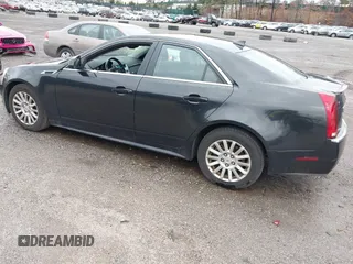 2011 Cadillac CTS z VIN 1G6DC5EY3B0107442, wystawiony jako IAAI lot #41918364 z przebiegiem 255 238 mil mil oraz . Historia ofert i sprzedaży dostępna na DreamBid. Obrazek 3.