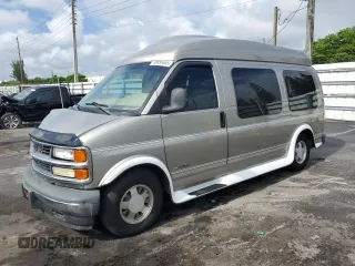 1999 Chevrolet Express z VIN 1GBFG15R1X1060560, wystawiony jako Copart lot #56858005 z przebiegiem 79 874 mil mil oraz Szkody całkowita. Historia ofert i sprzedaży dostępna na DreamBid. Obrazek 1.
