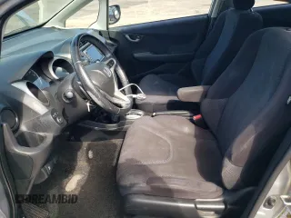 2011 Honda Fit Sport z VIN JHMGE8H67BC001041, wystawiony jako Copart lot #56109445 z przebiegiem 159 747 mil mil oraz Szkoda całkowita • Salvage title. Historia ofert i sprzedaży dostępna na DreamBid. Obrazek 7.
