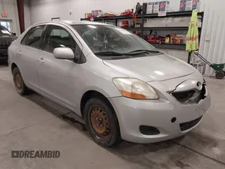 2009 Toyota Yaris with VIN JTDBT903391338448, listed as a IAAI auction lot 41583457 with 182,346 mi miles. Bid and sale history available at carsss.com. Image 1.