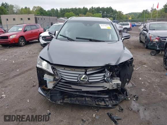 2016 Lexus RX 350 z VIN 2T2BZMCA1GC001812, wystawiony jako IAAI lot #42278639 z przebiegiem 69 648 mil mil oraz . Historia ofert i sprzedaży dostępna na DreamBid. Obrazek 13.