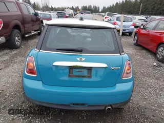 2009 MINI Cooper Hardtop with VIN WMWMF33569TW70413, listed as a IAAI auction lot 41776589 with 85,394 mi miles. Bid and sale history available at carsss.com. Image 16.