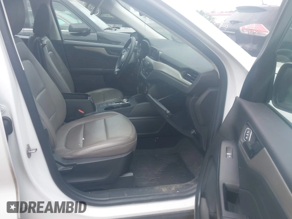 2021 Ford Escape S with VIN 1FMCU0F62MUA77668, listed as a IAAI auction lot 42281134 with 30,625 mi miles and . Bid and sale history available at DreamBid. Image 5.