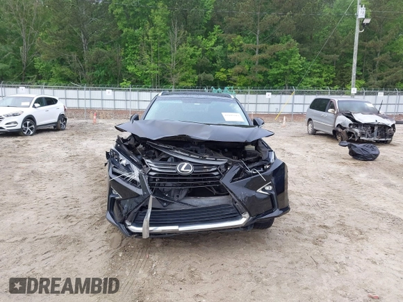 2016 Lexus RX 350 z VIN 2T2ZZMCA8GC005158, wystawiony jako IAAI lot #42105589 z przebiegiem 125 337 mil mil oraz . Historia ofert i sprzedaży dostępna na DreamBid. Obrazek 11.