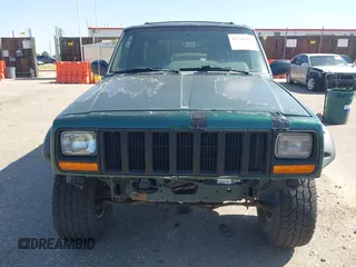 2001 Jeep Cherokee Sport z VIN 1J4FF48S81L513478, wystawiony jako IAAI lot #42245905 z przebiegiem 162 219 mil mil oraz . Historia ofert i sprzedaży dostępna na DreamBid. Obrazek 6.