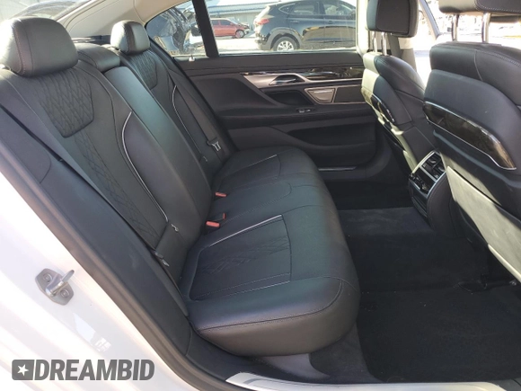 2019 BMW 7 Series 750i xDrive с VIN WBA7F2C50KB240508, выставлен на аукционе Copart как лот 80551464 с пробегом 51 271 миль миль и Списание • Salvage title. История ставок и продаж доступна на DreamBid. Изображение 11.