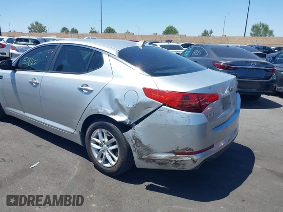 2013 Kia Optima LX z VIN KNAGM4A7XD5389662, wystawiony jako IAAI lot #42265945 z przebiegiem 164 488 mil mil oraz . Historia ofert i sprzedaży dostępna na DreamBid. Obrazek 3.
