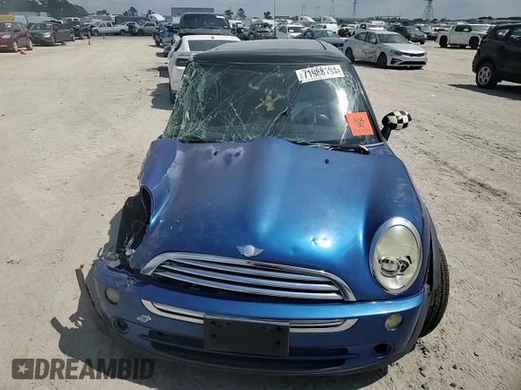 2006 MINI Hardtop with VIN WMWRC33566TK15023, listed as a Copart auction lot 76392014 with Not provided miles and Salvage title. Bid and sale history available at DreamBid. Image 11.