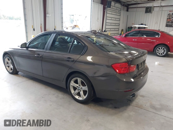 2015 BMW 3 Series 328i with VIN WBA3A5C57FF609734, listed as a IAAI auction lot 41392336 with 121,378 mi miles. Bid and sale history available at carsss.com. Image 3.