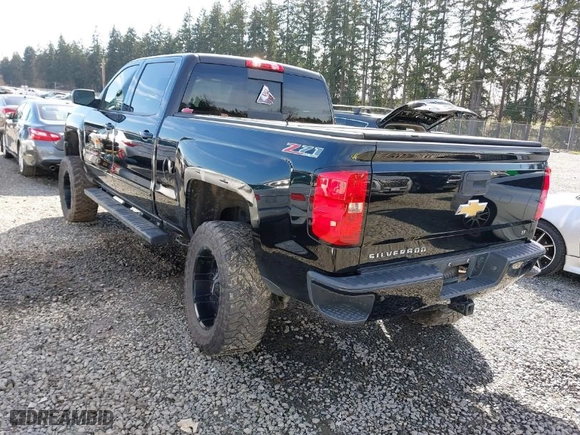 2016 Chevrolet Silverado 1500 LT with VIN 3GCUKREC0GG306088, listed as a IAAI auction lot 41870097 with 203,563 mi miles. Bid and sale history available at carsss.com. Image 3.