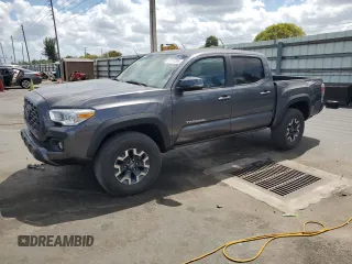 2021 Toyota Tacoma SR z VIN 5TFCZ5AN9MX265197, wystawiony jako Copart lot #51217585 z przebiegiem 44 175 mil mil oraz Czysty tytuł • Clean title. Historia ofert i sprzedaży dostępna na DreamBid. Obrazek 1.