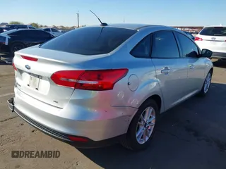 2018 Ford Focus SE z VIN 1FADP3F27JL204873, wystawiony jako IAAI lot #41657504 z przebiegiem 99 224 mil mil oraz . Historia ofert i sprzedaży dostępna na DreamBid. Obrazek 4.