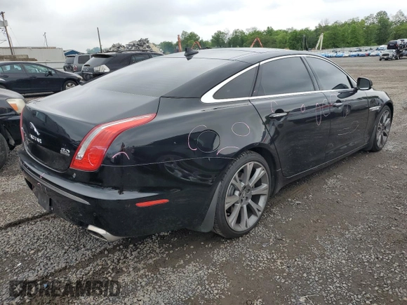 2013 Jaguar XJ Portfolio with VIN SAJWJ2GD0D8V44292, listed as a Copart auction lot 57073775 with 100,458 mi miles and Salvage Title. Bid and sale history available at DreamBid. Image 3.