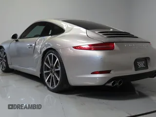 2012 Porsche 911 991 Carrera S with VIN WP0AB2A92CS122102, listed as a Copart auction lot 65763075 with 49,768 mi miles and Salvage title. Bid and sale history available at DreamBid. Image 4.