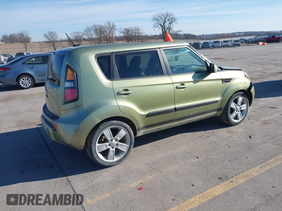 2011 Kia Soul + with VIN KNDJT2A2XB7281113, listed as a IAAI auction lot 41869852 with 155,095 mi miles. Bid and sale history available at carsss.com. Image 4.