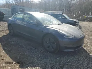 2022 Tesla Model 3 Long Range with VIN 5YJ3E1EB7NF257549, listed as a Copart auction lot 46980555 with 68,955 mi miles and Salvage Title. Bid and sale history available at DreamBid. Image 4.