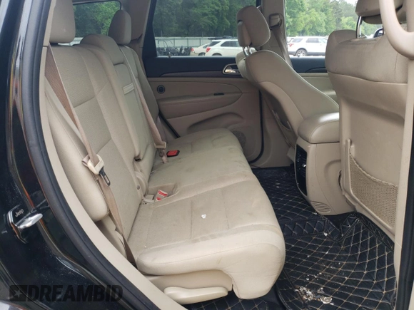 2016 Jeep Grand Cherokee Laredo with VIN 1C4RJEAG4GC394091, listed as a Copart auction lot 56595165 with 134,135 mi miles and Salvage title. Bid and sale history available at DreamBid. Image 10.