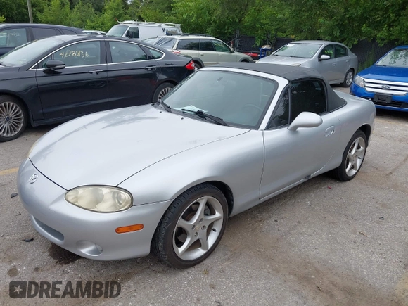 2002 Mazda MX-5 Miata Cloth with VIN JM1NB353820229890, listed as a IAAI auction lot 42750045 with 116,227 mi miles and . Bid and sale history available at DreamBid. Image 2.