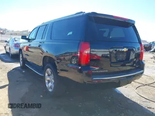2018 Chevrolet Suburban Premier z VIN 1GNSCJKC5JR386545, wystawiony jako IAAI lot #41684349 z przebiegiem 130 511 mil mil oraz . Historia ofert i sprzedaży dostępna na DreamBid. Obrazek 3.