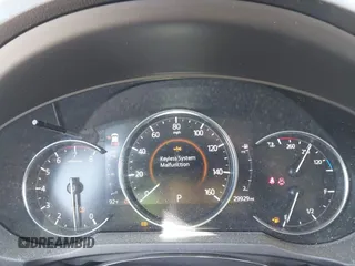 2020 Mazda CX-5 Grand Touring with VIN JM3KFADM9L0821930, listed as a IAAI auction lot 42549986 with 29,929 mi miles and . Bid and sale history available at DreamBid. Image 7.