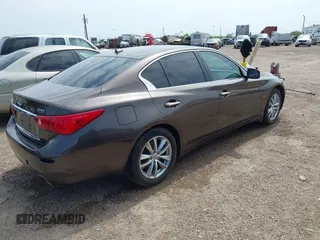 2014 Infiniti Q50 Sport with VIN JN1BV7ARXEM690925, listed as a IAAI auction lot 42163630 with 130,931 mi miles and . Bid and sale history available at carsss.com. Image 4.