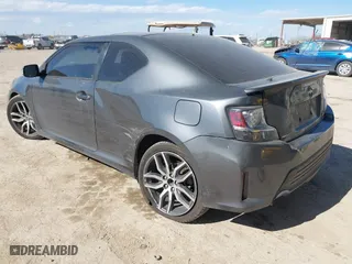 2014 Scion tC with VIN JTKJF5C74E3085237, listed as a IAAI auction lot 41788862 with 106,807 mi miles. Bid and sale history available at carsss.com. Image 3.