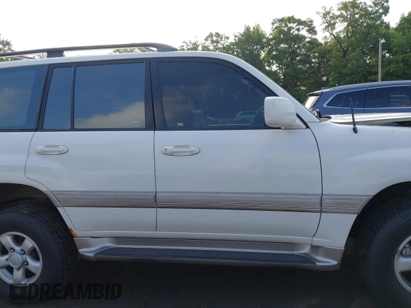 2000 Toyota Land Cruiser z VIN JT3HT05J4Y0084531, wystawiony jako IAAI lot #42381507 z przebiegiem 184 478 mil mil oraz . Historia ofert i sprzedaży dostępna na DreamBid. Obrazek 14.