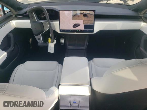 2023 Tesla Model S Plaid с VIN 5YJSA1E67PF528820, выставлен на аукционе Copart как лот 83111464 с пробегом 17 858 миль миль и Списание • Salvage title. История ставок и продаж доступна на DreamBid. Изображение 8.