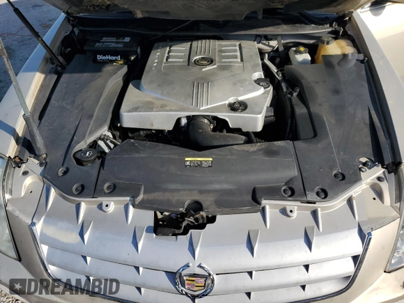 2007 Cadillac STS z VIN 1G6DW677970151227, wystawiony jako Copart lot #52345265 z przebiegiem 154 790 mil mil oraz Szkoda całkowita • Salvage title. Historia ofert i sprzedaży dostępna na DreamBid. Obrazek 13.