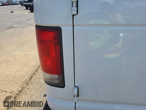 2014 Ford Econoline Cargo Commercial with VIN 1FTNE2EW0EDA53278, listed as a IAAI auction lot 42854412 with 188,803 mi miles and . Bid and sale history available at DreamBid. Image 12.