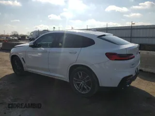 2019 BMW X4 xDrive30i with VIN 5UXUJ3C5XKLG54286, listed as a Copart auction lot 77333284 with 99,771 mi miles and Salvage Title. Bid and sale history available at carsss.com. Image 2.