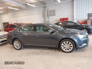 2014 Buick LaCrosse Leather with VIN 1G4GB5G39EF132695, listed as a IAAI auction lot 41728596 with 124,639 mi miles and . Bid and sale history available at DreamBid. Image 13.